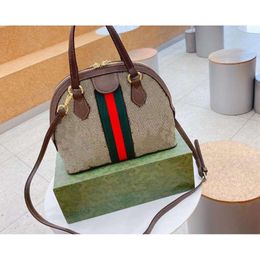 En gros de nouveau shell baojia rétro Fashion Handbag Messenger Bag