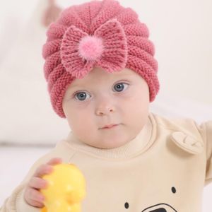 Groothandel pasgeboren babyhoed baby peuter beanie caps acryl winter gebreide hoeden jongens meisje designer schedel doppen gebreide bowknot pom poms muts bonnet