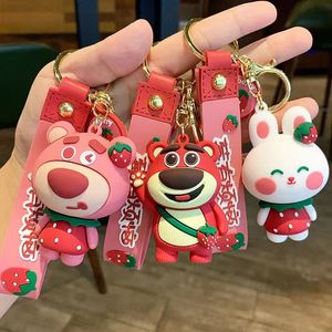 En gros de mignons de clés d'ouverture de petits ours rouges, pendentifs de lapin, clés de voiture, petits cadeaux d'étudiants, sacs à dos en gros