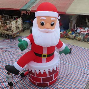 Venta al por mayor juegos al aire libre decoración navideña gigante inflable Papá Noel subir desde la chimenea para eventos en el patio publicidad inflables chimenea Santas