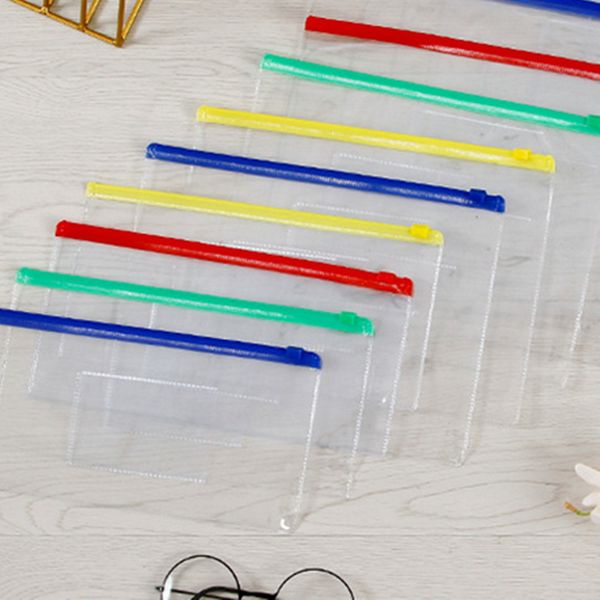 Venta al por mayor Bolsas de lápices Artículos de prueba Bolsas de archivos transparentes Material escolar de oficina para niños Estuches de lápices de 4 colores A12
