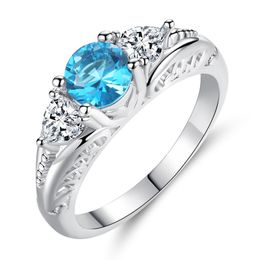 Groothandel-ring Europese en Amerikaanse saffier topaas verlovingsring holle ronde koper vier klauw mode-sieraden accessoires ringen cadeau