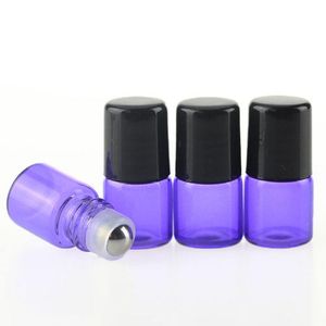 Vente en gros Roll On Bottles 1ml 2ml 3ml 5ml Bouteille de parfum d'huile essentielle de verre violet avec rouleau en métal