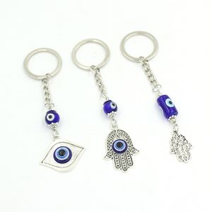 Groothandel ronde cilinder keramiek blauw Turkish Evil Eye Keychain Car Keyring Lucky Eyes Hamsa Hand Key Chain For Women Men Men Sieraden Gift