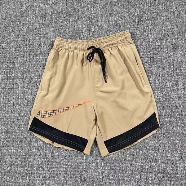 Shorts en gros Sports d'été pour hommes Lâche Plus Taille Basketball Casual Pantalon de course respirant Pantalon de fitness à séchage rapide sous le genou