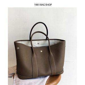 Top en gros Top original Hremmss Party Garden Tote Sacs en ligne Boutique en ligne Automne et Hiver Togo CowHide Garden Sac pour la première couche Advanced Inducio a un véritable logo