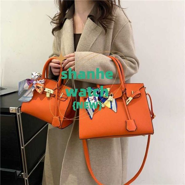 Venta al por mayor Top Bolsas de asas originales Tienda en línea 2024 Otoño Nuevo bolso simple y elegante Moda para mujer Maletín de mano grande con logotipo real 0ATZ