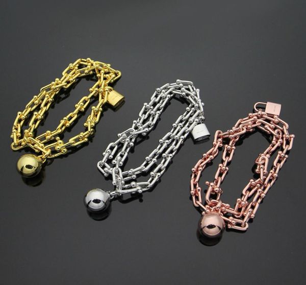 Commerce de gros de bracelet en titane T, serrure à bille en acier chaud, bracelet double lettre avec Bracelet en or 18 carats, Ms.5725904