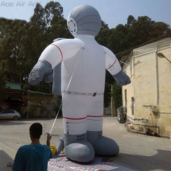 wholesale Casque gris vif corps blanc pose volante modèle de personnage d'astronaute gonflable avec sac spatial à l'arrière fabriqué en Chine pour