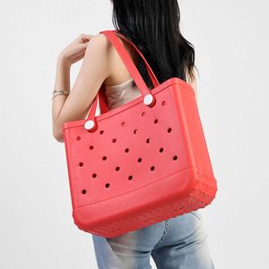 Femmes en gros de plage Sac fourre-tout imperméable Boches en caoutchouc grande mode Eva Plastic Silicone Sac avec trous pour femmes sacs à main