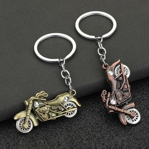 Venta al por mayor de aleación de zinc, llavero de motocicleta caliente, decoración colgante de simulación, ruedas de motocicleta reales que pueden moverse, un hermoso colgante para darle a las personas un llavero