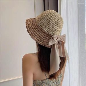 Brede rand hoeden 2023 Franse lint straw hoed mode buitenzon dames veelzijdige lange boog zomer grote dakranden schaduw strand pet femme gorra