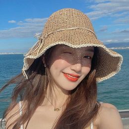 Brede rand hoeden 2023 Nieuwe stro hoed vrouwen Koreaanse versie zomer zee kust strand handgeweven emmer hoeden buiten zonbescherming cap gorras de mujeres g230227