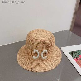 Wide Brim Hats Bucket Designer pour femmes luxurytes Chapeau de paille Fashion Hand Woven Cap Mens Summer Caps Big Bucket Sun 2304271DQ240403