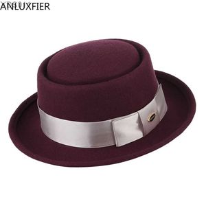 Brede rand hoeden emmer h7209 winter nieuwe wol fedora hoed unisex British Ribbon boog heren dames korte eafeer kerkfeest yq240403