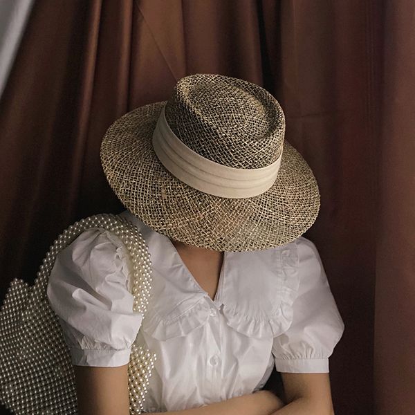 Sombreros de ala ancha Cubo Sombrero de playa de paja hecho a mano para mujer Sombrero de verano Gorra de Panamá Moda Cóncava Visera de protección solar plana Venta al por mayor 230615