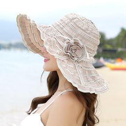 Chapeaux à large bord Seau Chapeaux HT1676 Mode Femmes Chapeau Corée Style Fleur Emballable Grand Chapeau À Large Bord Anti-UV Réglable Dames Floppy Beach Sun Hat 230306