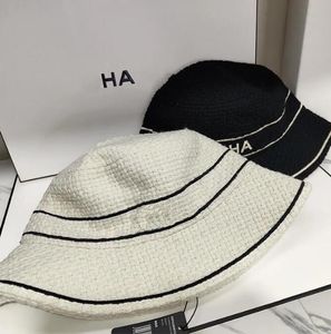 Brede rand hoeden emmer hoeden luxe designer emmer hoeden zwarte heren wit geweven hoeden dames mode herfst fedora gemonteerd sunhat