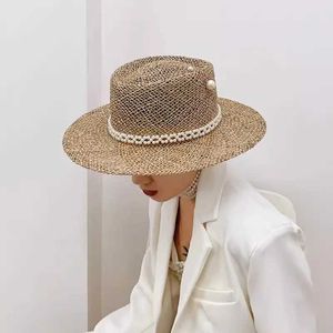 Chaps à bord large chapeau seau de seau d'été Str Hat Pin de perle femme d'été Seaside Sunshine Hollow Groove Top Flat Str Hat Sombrero J240425