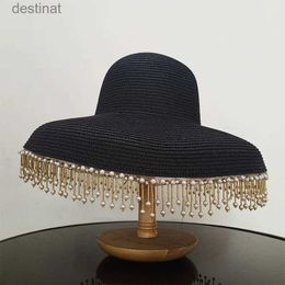 Chapeaux à bord large chapeau seau de seau pour femmes chapeau de soleil fashion maison hepburn frange perle paille de paille