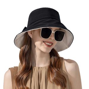 Sombreros de ala ancha Sombreros de cubo Sombrero de protección solar de verano para mujer con lazo elegante sombrero de playa de protección solar para mujer Equipo para la cabeza de ala ancha al aire libre recién llegados al por mayor 240322