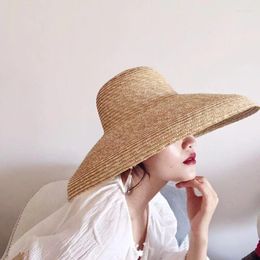 Brede rand hoeden elegante koepel klokvormige stro -dame zomer zonneschade concave strandhoed