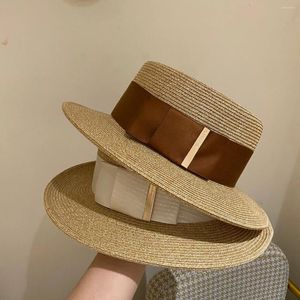 Sombreros de ala ancha Tapa plana Sombrero de paja de las mujeres francesas Moda Versión coreana Protector solar Salida de playa Top británico para hombres y mujeres