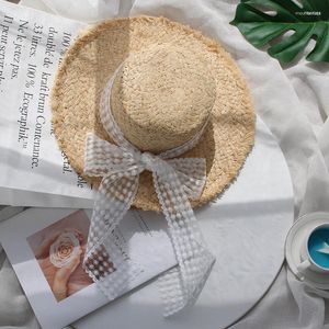 Chapeaux à large bord Tissage de raphia naturel Casquette de soleil Big dentelle Bow Panama Chapeau Voyage Plage Femmes Protection tissée à la main Été Sombrero