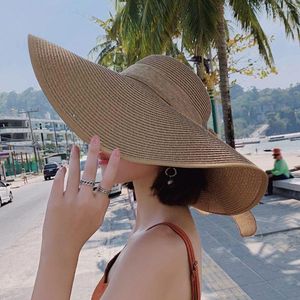 Chapeaux à large bord Panama Big Eaves Mesdames Bord de mer Voyage Plage Été Pliable Chapeau de paille pour femme Roll Up Cap