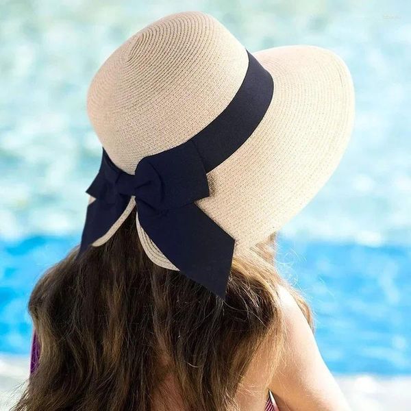 Chapeaux à large bord printemps et été sortie décontractée tricot femmes polyvalentes en plein air ombre crème solaire vide queue arc chapeau de paille