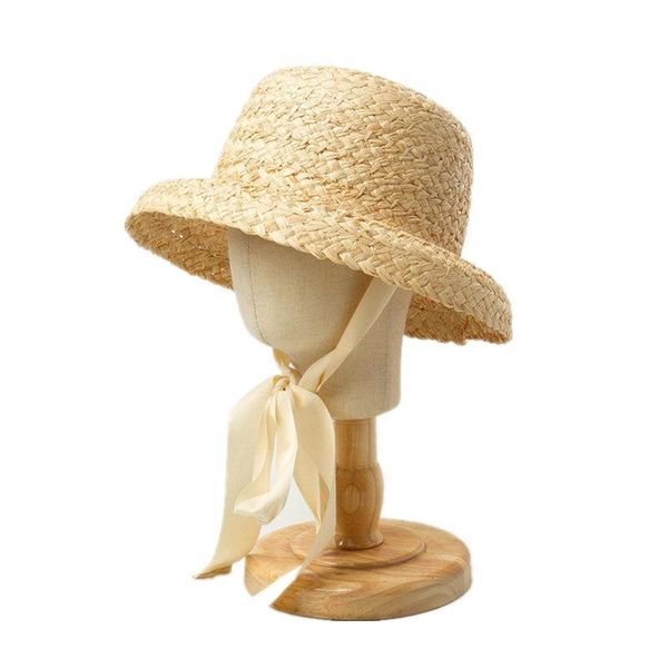 Sombreros de ala ancha, venta al por mayor, sol de verano para niñas con cinta larga, sombrero de playa de rafia plana para niños, accesorios de cubo de paja UV para niños