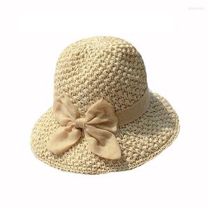 Brede rand hoeden vrouwen geweven boog knoop papieren gras visser hoed gezicht bedekkende zon grote zonnebrandcrème elegante strandemmer