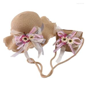 Chapeaux à large bord XEONGKVI ruban de fleurs européen Parent-enfant sac de soleil costume été marque mode Falbala paille pour femmes fille enfant