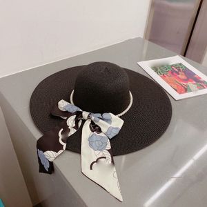 Brede rand ontwerper emmer hoed heren en dames buiten elegante stro hoed parel sjaals boogdecoraties klassieke letter strand hoed