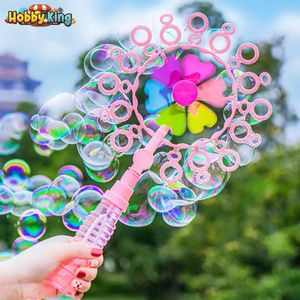 Les bulles de moulin à vent bâtons Toys for Kids Handheld Magic Wand Soap Machine Summer Party Game Outdoor Game Enfants Gift 240415