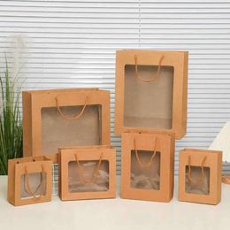 Window PVC Groothandel Kraft 100pcs/Lot Paper met handgrepen Festival Gift Bag