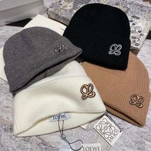 Chapeau d'hiver Cap E Haute Qualité Designer Caps Hommes Femmes Hiver Populaire Laine Chaud Tricot Chapeau Nouvelle Mode Beanie Bobbles