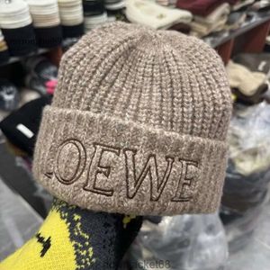 Chapeau d'hiver Cap E Officiel Qualité Designer Beanie Caps Hommes Femmes Hiver Populaire Laine Chaud Tricot Chapeau 01oj8h