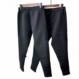 Pantalons d'hiver de haute qualité pour hommes Pantalons pour hommes en tissu à couche d'air mélangée Automne 2023 Manchette Zip Casual Sport Pantalon de survêtement A7XO #