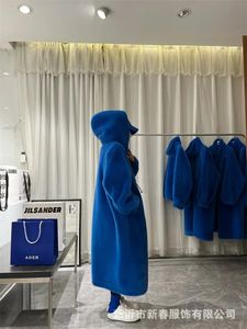 Hiver Long surdimensionné chaud épais bleu blanc moelleux fausse fourrure manteau femmes avec capuche ample décontracté Style coréen mode 240110