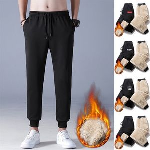 Winter broek mannen bont gevoerd joggers vrouw dikke sweatpants trekkoord broek fleece running warm plus size 5XL 220325