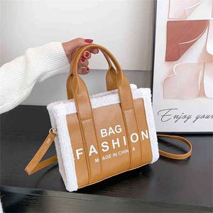 Sac à bandoulière asymétrique épaule dénudée pour femme, fourre-tout signature de grande capacité, nouvelle mode, sac messager simple, sens avancé, hiver 2022