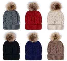 Hiver épaisse double couche Colonceau de neige colorée chapeau de bonnet en tricot en laine avec raton laveur artificiel Pom Pom pour femmes hommes Hip Hop CA7679590