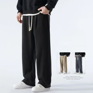 Papent de survêtement chaud épais d'hiver Men Streetwear Pantalon de survêtement en vrac droit