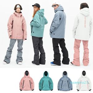 Invierno ropa de moda trajes de esquí rosa para hombres y mujeres que mantienen una chaqueta de esquí cálida y fría abrigo de snowboard multicolor multicolor
