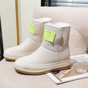 Bottes d'hiver bottes de neige pour femmes hiver nouvelles chaussures en coton polyvalent pain semelle épaisse en peluche cuir chaud anti-dérapant court