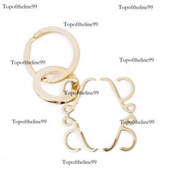 Avec boîte de couverture de couverture anagramme sac pour femmes charme gold sier keyring en acier inoxydable Chaîne de mode Classic Key Ring Original Edition