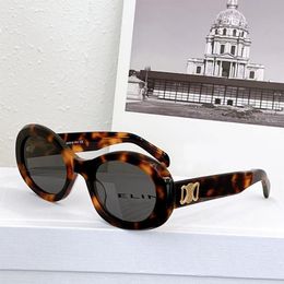 Avec des lunettes de soleil de concepteur de boîte rétro Cats Eye pour femmes Ces lunettes de soleil ovales Arc De Triomphe