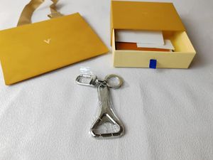 Avec une boîte de mode de mode de mode Key Chain Bottle Designer Logo sculpté en alliage argenté Couctes de boucle masculine et femmes porte-clés décoratifs de la mode