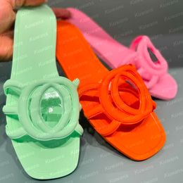 Sandalias de diseñador Mujeres entrelazadas de toboganes G zapatillas de goma de goma damas guión de playa plana guión naranja mulas de otoño de verano